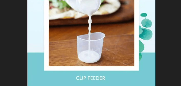 Cara memberi minum bayi